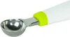 A close-up shot of a melon baller with a white handle and a green accent. Produktbild-Vorschau