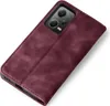 A burgundy flip case for a smartphone is shown from a diagonal angle against a white background. Produktbild-Vorschau