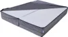 A partially opened gray folding mattress on a white background. Podgląd zdjęcia produktu