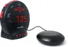 A black Sonic Bomb alarm clock with a red vibrating puck is shown on a white background. Produktbild-Vorschau