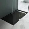 A modern black shower tray with a silver drain in a bathroom. Produktbild-Vorschau