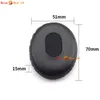 A black headphone earpad with dimensions indicated by lines and text. Produktbild-Vorschau