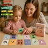 A woman and a child are sitting at a table playing with learning cards. Produktbild-Vorschau