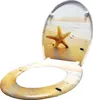 A toilet seat with a beach and starfish design. Náhled obrázku produktu