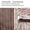 A close-up of a soft, striped blanket with text describing its anti-static properties. Produktbild-Vorschau