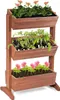 A three-tiered wooden planter filled with plants. Náhled obrázku produktu