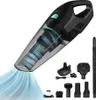 A black and transparent handheld vacuum cleaner with various attachments and a charging base, displayed on a white background. Podgląd zdjęcia produktu