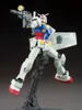 A plastic model of a Gundam robot in a dynamic pose, holding a weapon and shield, mounted on a display stand. Anteprima dell’immagine prodotto