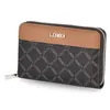 A studio shot of a brown and black L.CREDI wallet. Anteprima dell’immagine prodotto