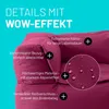 Close-up of a burgundy beanbag sofa corner, highlighting its features with text overlays and icons. Voir les images du produit