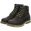A pair of brown leather boots on a white background. Voir les images du produit