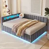 A modern bed with integrated LED lighting and storage, set in a bedroom. Náhled obrázku produktu