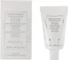 A product shot of a box and a tube of Sisley facial cream. Podgląd zdjęcia produktu