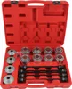 A red plastic case containing a set of tools for removing and installing silent blocks or bushings. Produktbild-Vorschau