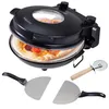 A black electric pizza oven with a pizza inside, along with a pizza cutter and two pizza peels. Produktbild-Vorschau