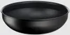 A black wok pan is shown from a slightly elevated side angle against a light gray background. Voir les images du produit