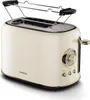 A cream-colored toaster with gold accents, shown from a slightly elevated front-side angle against a white background. Podgląd zdjęcia produktu