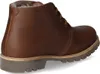 A side view of a brown leather boot with a fur lining. Voir les images du produit