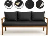 A black cushion set on a wooden bench. Anteprima dell’immagine prodotto