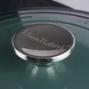Close-up of a pot lid with a silver knob. Podgląd zdjęcia produktu