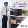 A man is refilling ink into an Epson EcoTank printer, which is placed on a shelf. Náhľad obrázku produktu