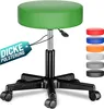 A green rolling stool is shown against a white background. Additional colored swatches of the stool's seat are displayed on the right side. A tag with German text is attached to the stool. Produktbild-Vorschau
