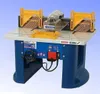 A woodworking router table with safety guards and a dust collection shroud. Produktbild-Vorschau