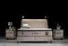 A bed set with two nightstands against a black background. Produktbild-Vorschau