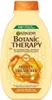 A bottle of Garnier Botanic Therapy shampoo with honey and propolis. Anteprima dell’immagine prodotto