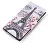 A flip-style phone case with an Eiffel Tower and floral design. Produktbild-Vorschau