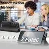 Two people are looking at a table with a phone case and a phone. Produktbild-Vorschau