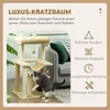 A cat is playing on a cat tree in a living room setting. Anteprima dell’immagine prodotto