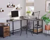 A modern home office setup featuring an L-shaped desk, chair, computer, and filing cabinet. Náhled obrázku produktu