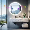 A modern bathroom with a large round LED mirror, a marble vanity, and a scenic view through a large window. Anteprima dell’immagine prodotto