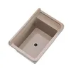A top-down view of a beige sink basin. Anteprima dell’immagine prodotto