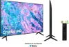 A Samsung TV with its remote control and stand, displaying a colorful abstract image on its screen. There are also icons indicating voice assistant and eco-friendliness. Produktbild-Vorschau