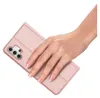 A hand is holding a pink phone case. Produktbild-Vorschau