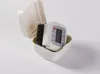 A blood pressure monitor and its cuff are placed inside an open white plastic case. Produktbild-Vorschau