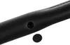 A close-up view of a black tool with a small cap next to a hole in it. Voir les images du produit