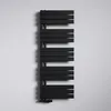 A black radiator mounted on a white wall. Produktbild-Vorschau