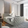 A bedroom with a bed, nightstand, and curtains. Produktbild-Vorschau