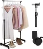 A clothing rack with several garments and a pair of shoes, along with some separate parts of the rack. Produktbild-Vorschau