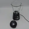 A blender with its lid placed next to it, on a white background. Voir les images du produit