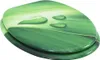 A toilet seat with a lid, featuring a green leaf and water droplet design. Náhľad obrázku produktu