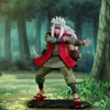 A figurine of Jiraiya from Naruto Shippuden posed in a forest setting. Podgląd zdjęcia produktu