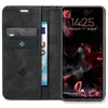 A black flip-case wallet for a smartphone, showing the inside with card slots and a banknote, and the phone screen displaying the time and date. Produktbild-Vorschau