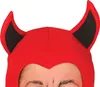 A close-up of a child wearing a red devil hood with black ears. Anteprima dell’immagine prodotto