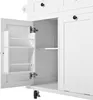 A close-up view of the interior of a white kitchen island, showing open cabinet doors and shelves. Náhled obrázku produktu