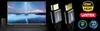 A television screen displaying a starry sky over a body of water, next to a soundbar and subwoofer. To the right are two HDMI cables and various logos indicating features. Podgląd zdjęcia produktu
