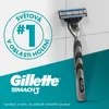 A Gillette Mach 3 razor is shown against a tiled background with marketing text and logos. Náhled obrázku produktu